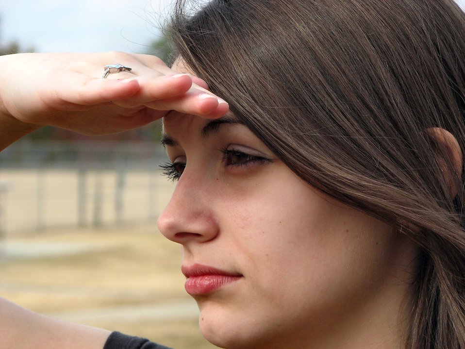 Closeup of a teen girl's face looking in the distance : Free Stock Photo