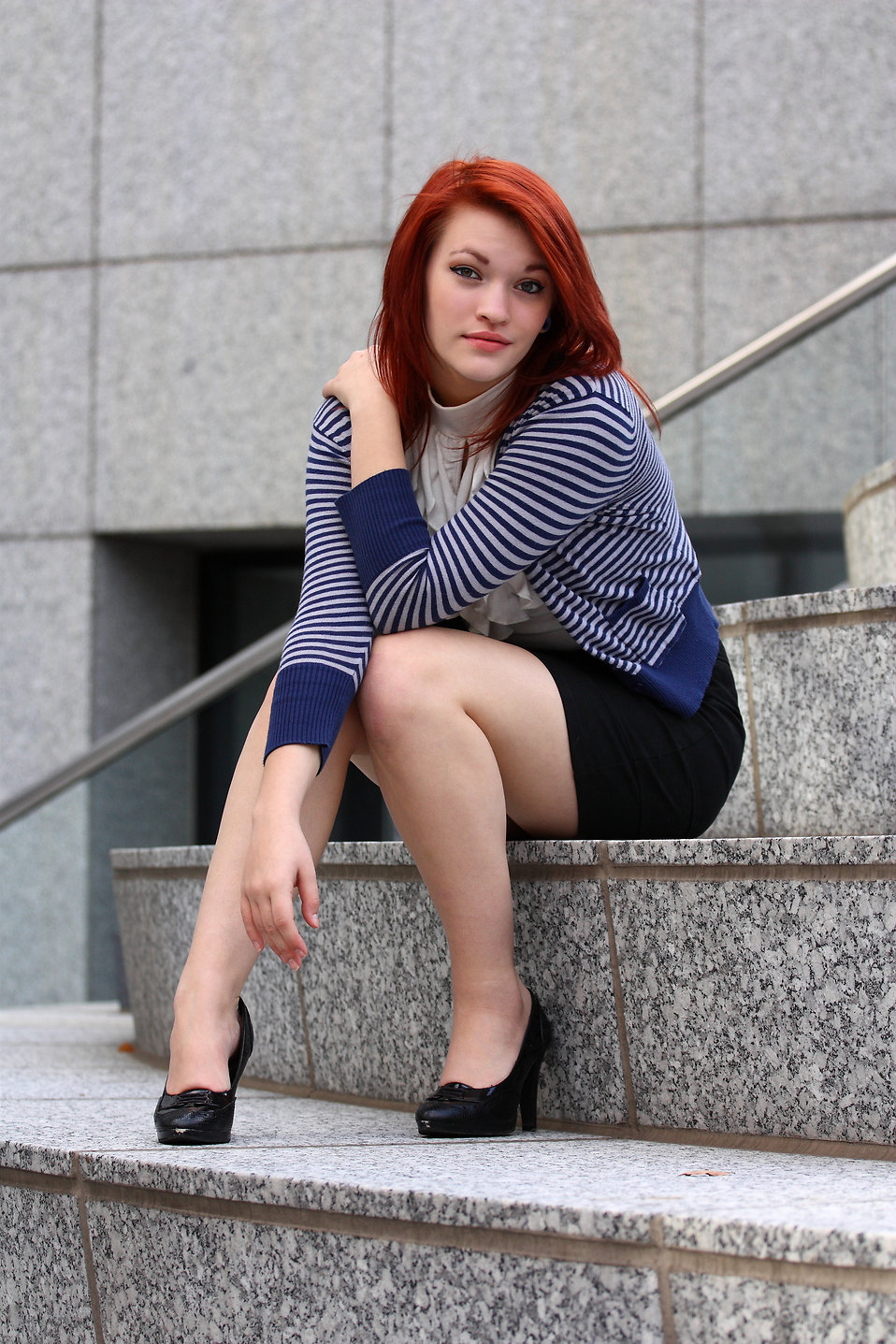 A beautiful young woman in business attire : Free Stock Photo