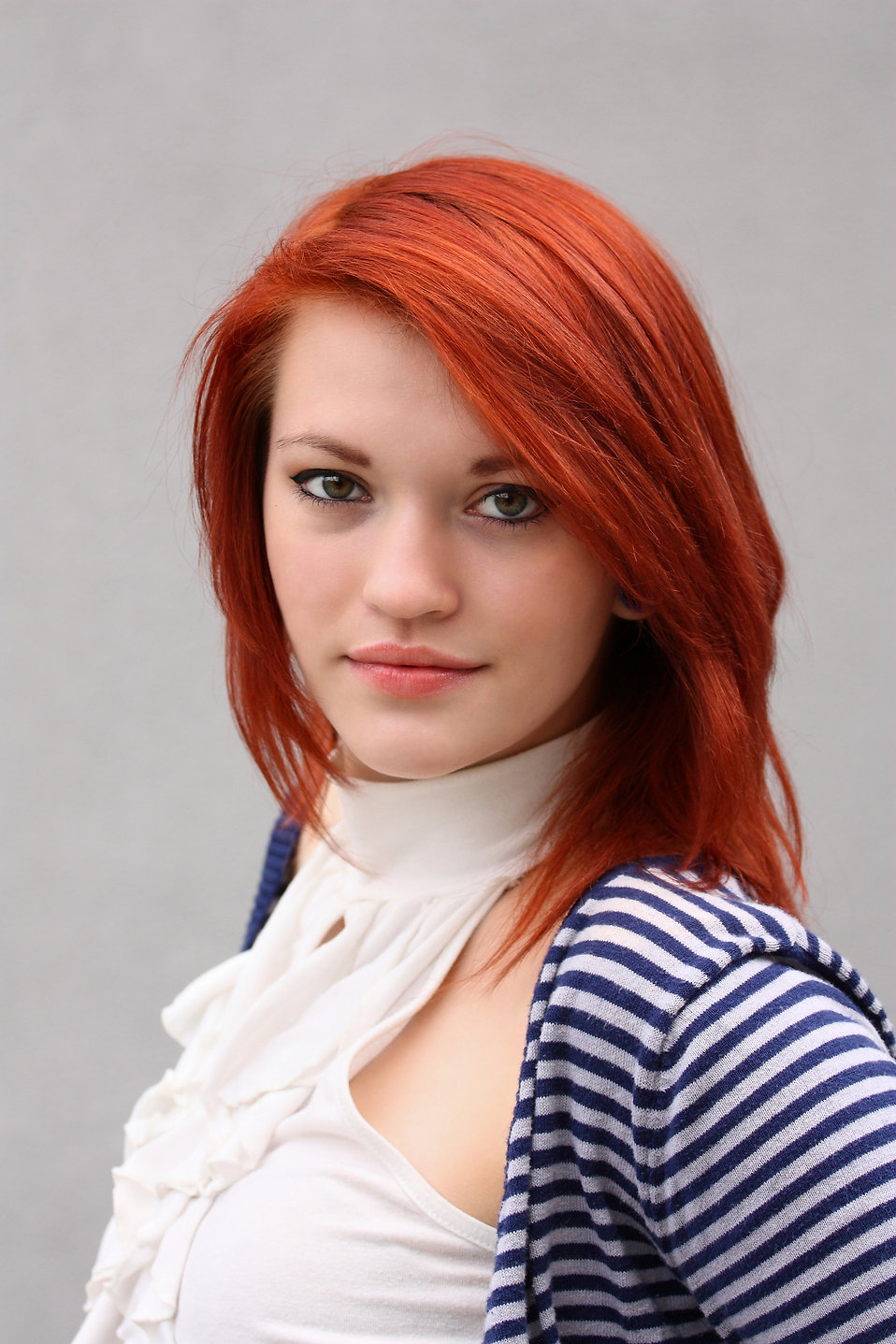 A beautiful young woman in business attire : Free Stock Photo