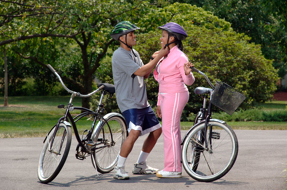 http://res.freestockphotos.biz/pictures/17/17048-an-african-american-couple-preparing-for-bike-ride-pv.jpg