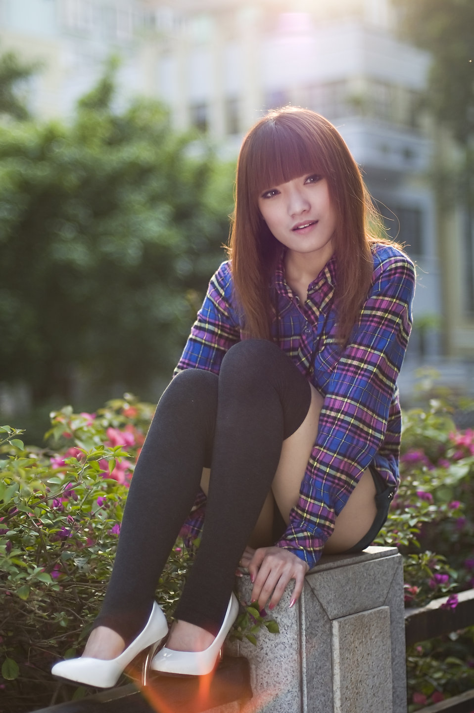 A beautiful Chinese girl posing outdoors : Free Stock Photo