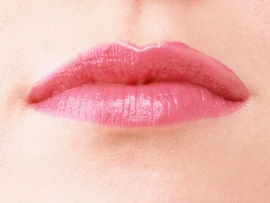 Free Stock Photo: Close-up of a woman's mouth and lips with pink lipstick
