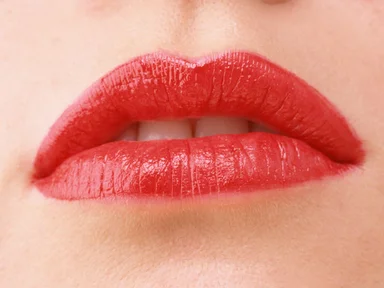 Free Stock Photo: Close-up of a woman's mouth and lips with red lipstick