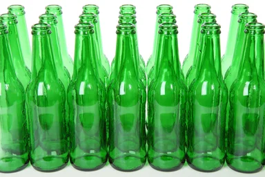 Free Stock Photo: Empty green beer bottles isolated on a white background