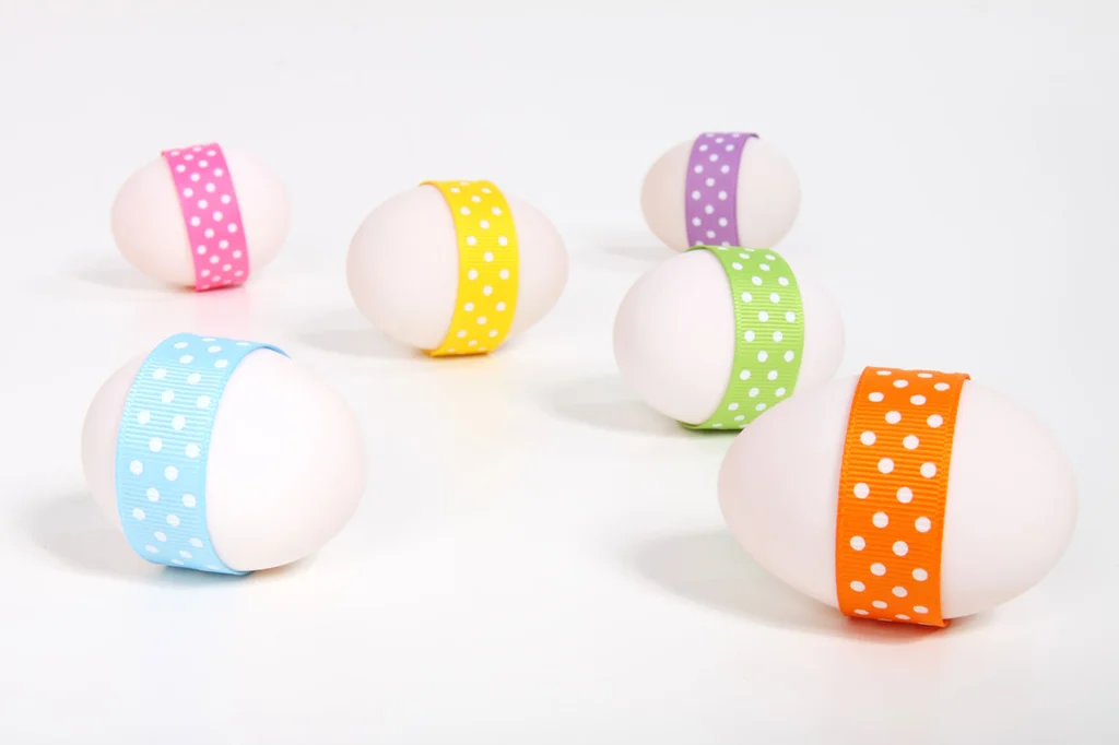 Easter eggs with ribbons isolated on a white background : Free Stock Photo