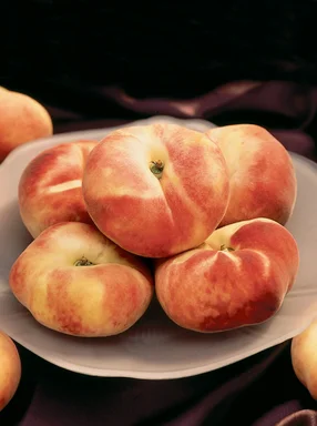 Free Stock Photo: A plate with several Galaxy peento peaches