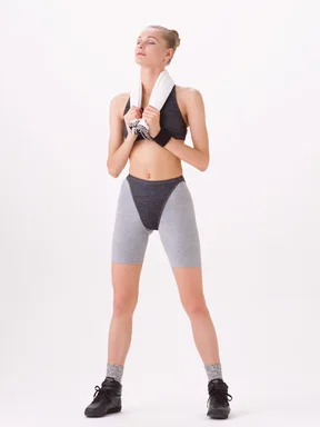 Free Stock Photo: A beautiful blonde exercising isolated on a white background