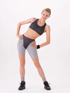 Free Stock Photo: A beautiful blonde exercising isolated on a white background
