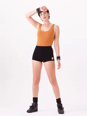 Free Stock Photo: A beautiful brunette exercising on a white background