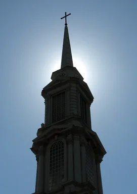 Free Stock Photo: A church steeple with a cross