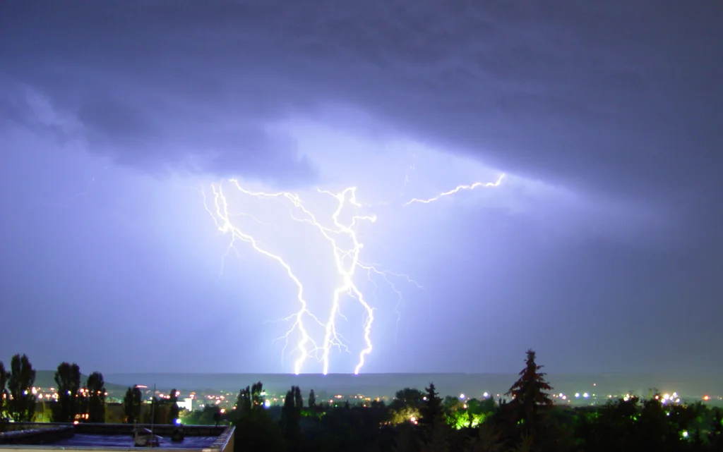 Lightning striking at night : Free Stock Photo