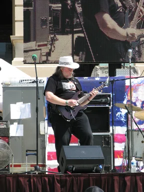 Free Stock Photo: A man playing a guitar at the 2010 Atlanta tax day tea party in Atlanta, Georgia