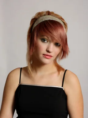 Free Stock Photo: A beautiful young woman posing in a black dress
