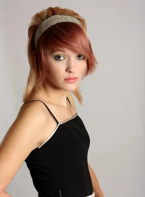 Free Stock Photo: A beautiful young woman posing in a black dress