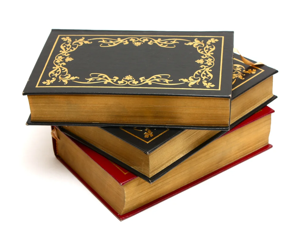 An stack of old books isolated on a white background : Free Stock Photo
