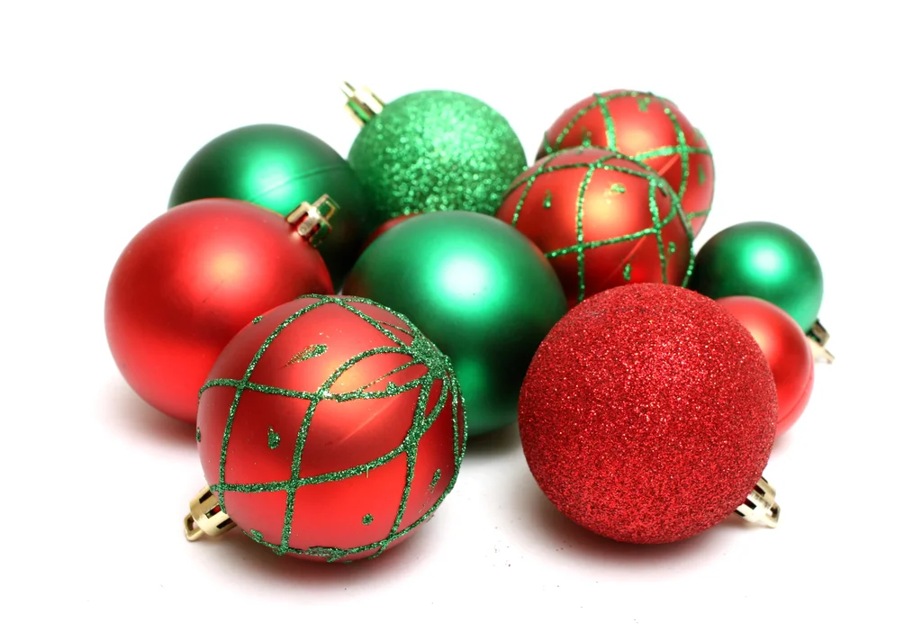 Red and green Christmas ornaments isolated on a white background : Free Stock Photo