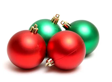 Free Stock Photo: Red and green Christmas ornaments isolated on a white background