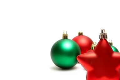 Free Stock Photo: Green and red Christmas ornaments isolated on a white background