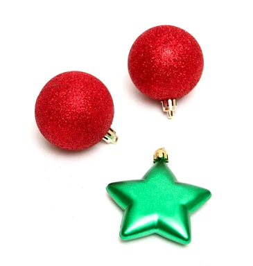 Free Stock Photo: Red and green Christmas ornaments isolated on a white background