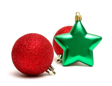 Free Stock Photo: Red and green Christmas ornaments isolated on a white background