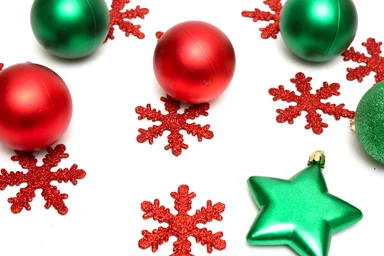 Free Stock Photo: Red and green Christmas ornaments isolated on a white background