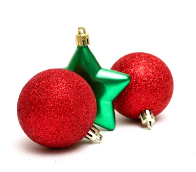 Free Stock Photo: Red and green Christmas ornaments isolated on a white background