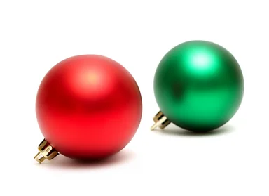 Free Stock Photo: Red and green Christmas ornaments isolated on a white background