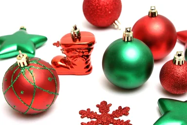 Free Stock Photo: Green and red Christmas ornaments isolated on a white background