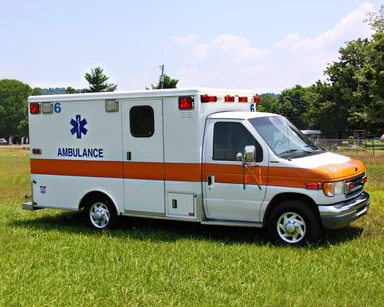 Free Stock Photo: An ambulance parked on the grass