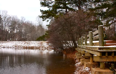 Free Stock Photo: A snow covered dock by a lake