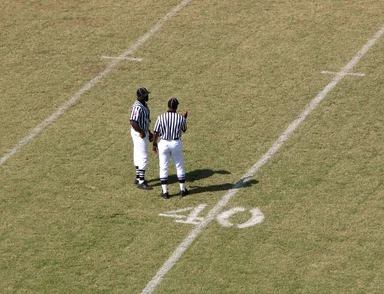 Free Stock Photo: Football referees on a field
