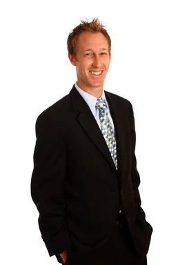 Free Stock Photo: A young businessman in a suit isolated on a white background