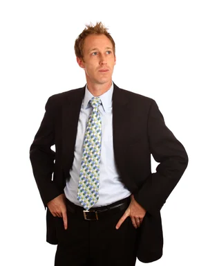 Free Stock Photo: A young businessman in a suit isolated on a white background