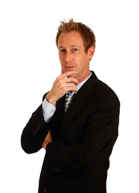 Free Stock Photo: A young businessman in a suit isolated on a white background