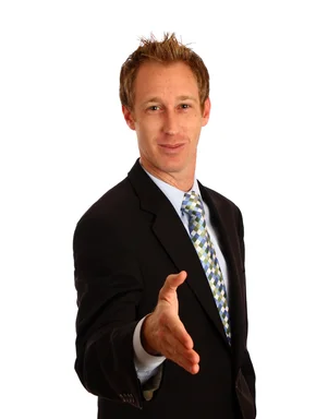 Free Stock Photo: A young businessman extending his hand for a handshake