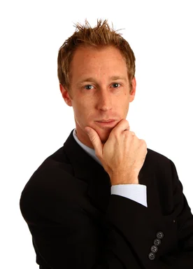 Free Stock Photo: A young businessman in a suit isolated on a white background