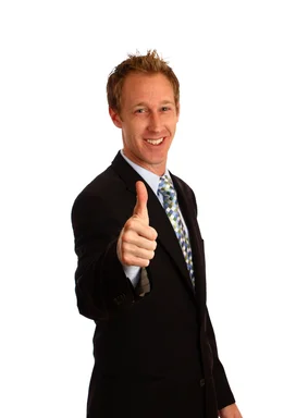 Free Stock Photo: A young businessman giving a thumbs up signal