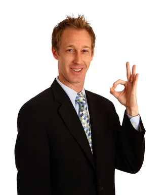 Free Stock Photo: A young businessman giving an ok signal
