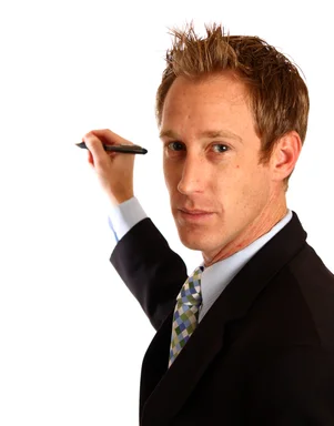 Free Stock Photo: A young businessman writing with a pen
