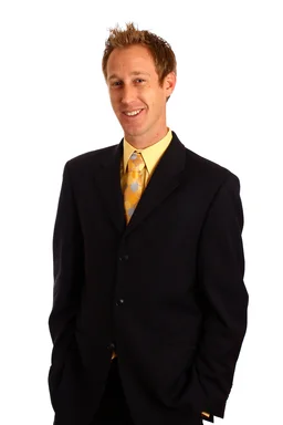 Free Stock Photo: A young businessman in a suit and tie isolated on a white background