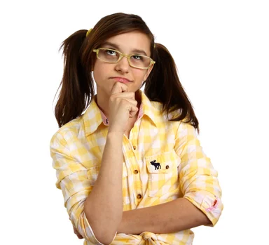 Free Stock Photo: A smart girl with glasses posing with a thoughtful expression