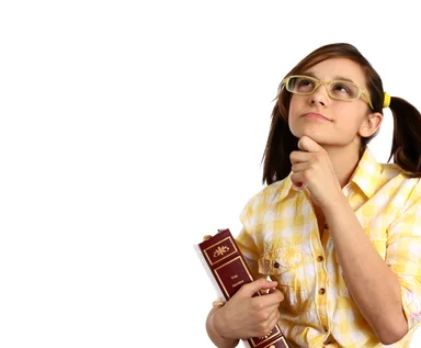 Free Stock Photo: A smart girl with glasses holding a book