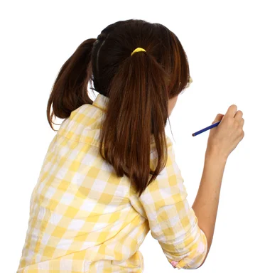 Free Stock Photo: A smart girl with glasses writing with a pencil