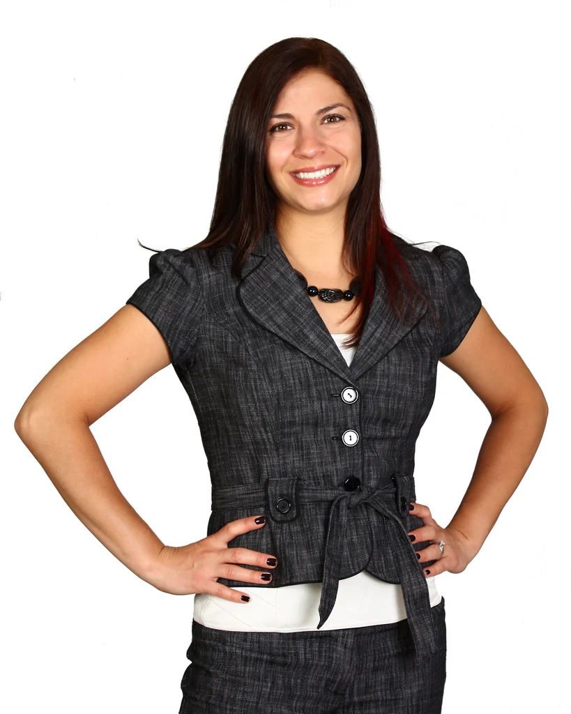 A beautiful young business woman posing on a white background : Free Stock Photo