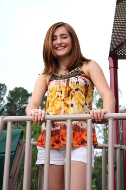 Free Stock Photo: A beautiful young girl playing on a playground