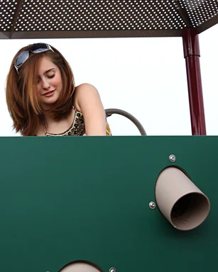 Free Stock Photo: A beautiful young girl playing on a playground