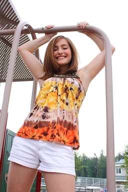 Free Stock Photo: A beautiful young girl playing on a playground