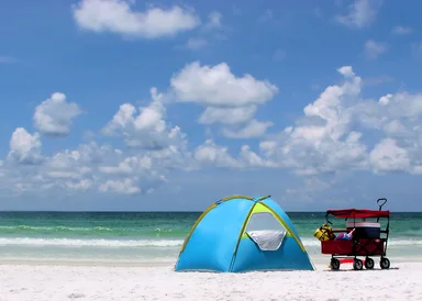 Free Stock Photo: A tent and buggy on a beach