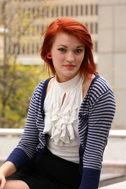 Free Stock Photo: A beautiful young woman posing outdoors