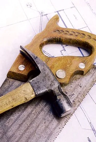 Tools on a set of blueprints : Free Stock Photo